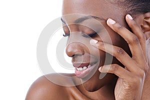 Shes got the look...Closeup studio shot of a beautiful african american model isolated on white.