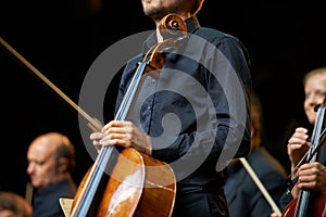 Shes got talent. a musician during an orchestral concert.