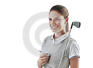 Shes got the will to win. Studio shot of a young golfer holding a golf ball and iron club isolated on white.