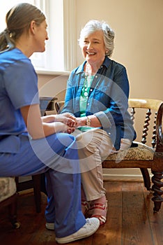 Shes grateful for the support. Shot of a resident being consoled by a nurse in a retirement home.