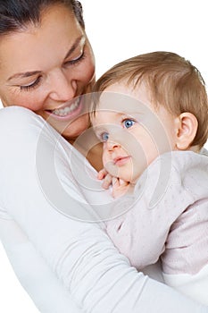 Shes my special girl. An attractive woman holding her little baby.