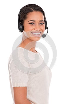 Shes super friendly on the phone. A young female customer service representative wearing a headset.