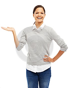 Shes supports this wholeheartedly. Studio portrait of an attractive young woman gesturing to copyspace isolated on white