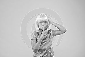 Shh, stop talking. kid show silence sign. secret and mysterious. demand to be quiet and not tell secret. small girl show