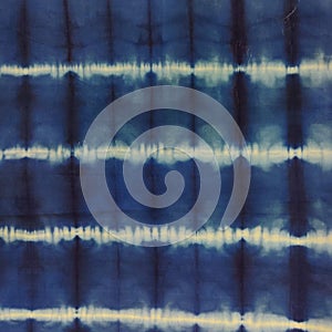 Shibori Tie Dye patterned cotton fabric texture in navy