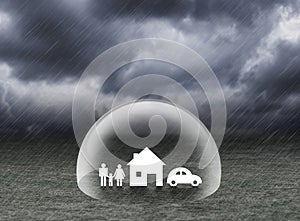 Shield covering home,car and family under rain