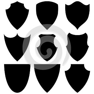 Shield Icon in trendy flat style. Set of shields in different shapes. Conceptual symbol of protection, safety, security and