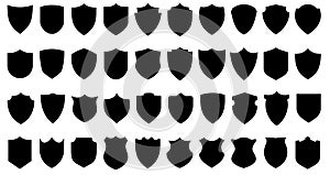 Shield icons set. Black shields of different shapes in flat graphic design.