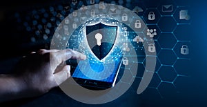 Shield with key inside on blue background The concept of cybersecurity the Internet