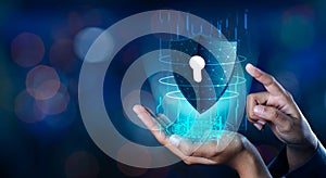 Shield with key inside on blue background The concept of cybersecurity the Internet