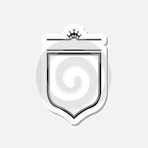 Shield with king crown sticker isolated on gray background