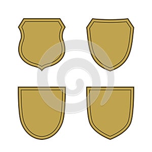 Shield shape gold icons set. Simple flat logo on white background. Symbol of security, protection, safety, strong