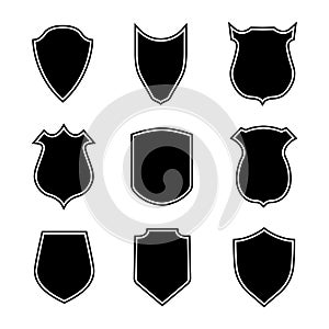 Shield shapes. Crest and badge of security. Set of black emblem, silhouette for military, police and soccer. Logo of safety,