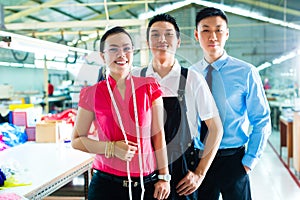 Worker, manager and designer in Chinese factory