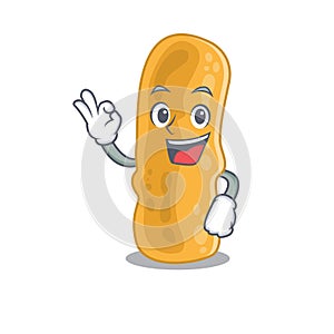 Shigella flexneri mascot design style with an Okay gesture finger photo