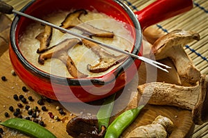 Shiitake mushrooms with vegetables and smelted goat cheese