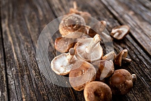 Shiitake on rustic wooden background