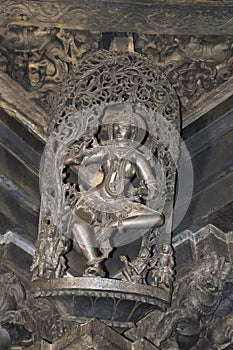 Shilabalika, celestial maiden, Natya Rani Shantala devi on top of the pillars inside the main hall. Chennakeshava temple, Belur, K photo