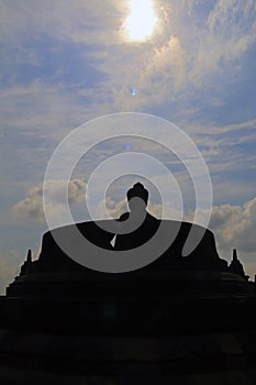 A shilouette of opened stupa from the below
