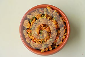 Shimla Mirch Zunka, Besan Capsicum Sabzi, a spicy Maharashtrian dish, served with bhakri or chapati