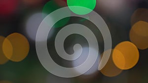 Shimmering abstract colored circles defocused christmas lights background. Blurred fairy lights. Out of focus holiday back