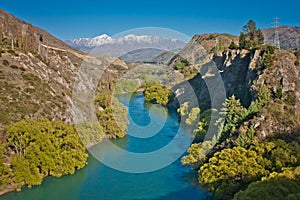 Shimmering blue water of Kawarau river near Queenstown, New Zealand