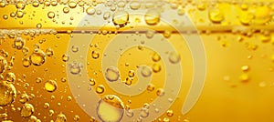 Shimmering golden liquid background with oil bubbles and elegant golden droplets