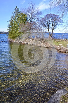 Shimmering reflections along the shore of Kempenfelt Bay