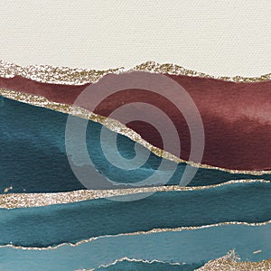 Shimmering teal and brown on white paper background