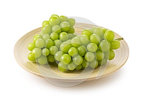 Shine Muscat grapes on a white background