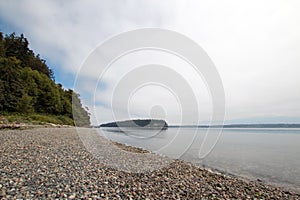 Shine Tidelands State Park shoreline of Bywater Bay near Port Ludlow in the Puget Sound in Washington State