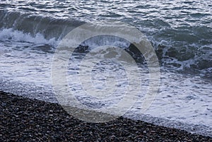 A shingle beach or beach stone urban runoff entering a storm drain