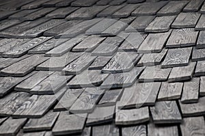 Shingle red cedar wooden shake wood siding row roof panel made of larch conifer tree.