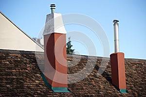 Shingle roof with two chimneys