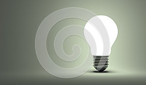 Shining arbitrary light bulb on gray