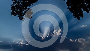 Shining behind the clouds