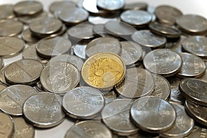 Fifty euro cents coin on a pile of rubles