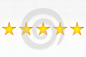 Shining five star symbol, hand made from cardboard, the concept of a positive rating, reviews