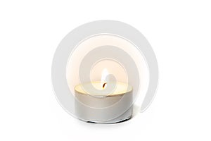 Shining flame on a tea light candle