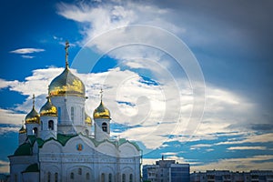 Shining golden domes of a Russian Orthodox Church in Barnaul