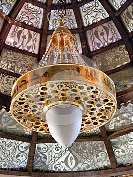 Shining lantern in khan el khalili souq market with Arabic handwriting on it in egypt cairo photo