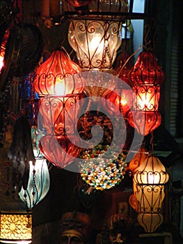 Shining lanterns in khan el khalili souq market with Arabic handwriting on it in egypt cairo