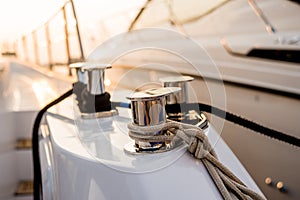 Shining metallic yacht deck details. Daylight background.