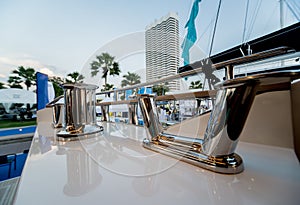 Shining metallic yacht deck details. Daylight background.