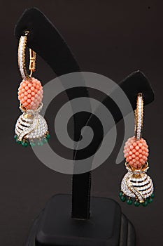 shining pearl studded traditional jhumka earrings for women