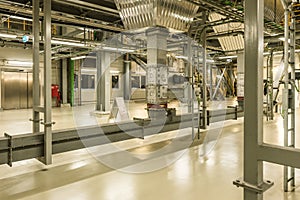 Shining steel installations with electric wires and pipes for steam, Inside the Roskilde Plant