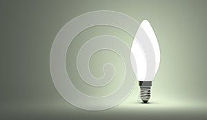 Shining torpedo light bulb on gray