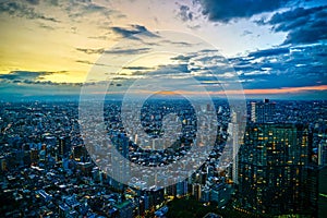 Shinjuku of city landscape and sunset visible from the observatory of the Tokyo Metropolitan Government Building