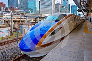 Shinkansen high speed train at a train station