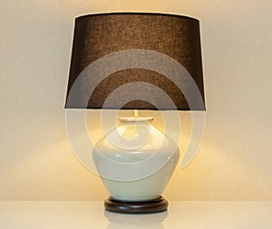 Shinning lamp on bedside table